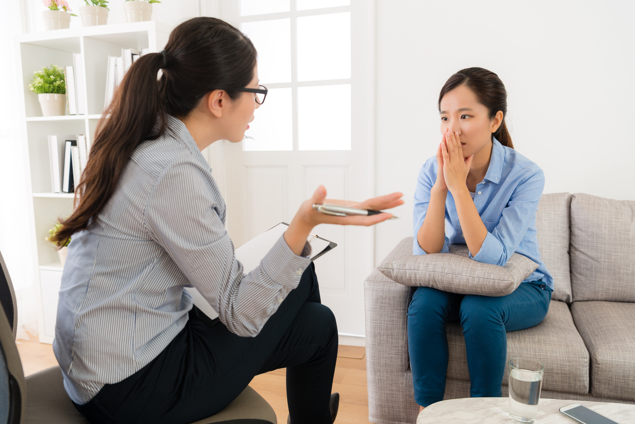 Psychologist Doctor Talking with Her Patient